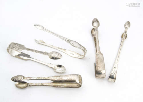 Five pairs of George III and later silver sugar tongs