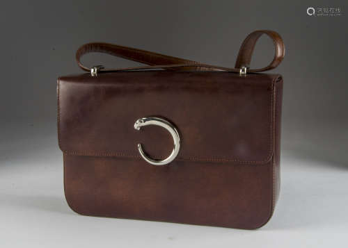 A modern leather handbag by Cartier