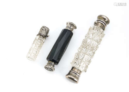 Three Victorian and later cut glass and silver and silver plated scent bottles