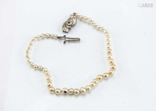 A certified early 20th Century natural pearl bracelet