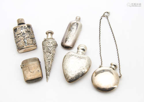 A late Victorian silver heart shaped perfume bottle
