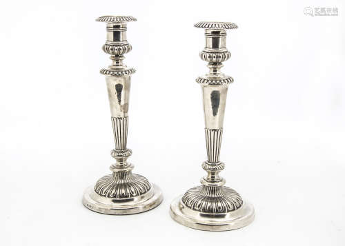A pair of large George III silver filled candlesticks by John Roberts & Co