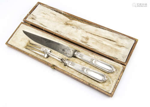 A cased late 19th Century French silver handled carving knife and fork set                                                                                                                                                          Jewellery