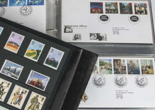 A collection of Royal Mail Mint stamps and First Day Covers