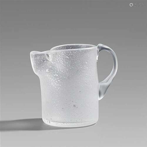 A glass jug. Around 1970