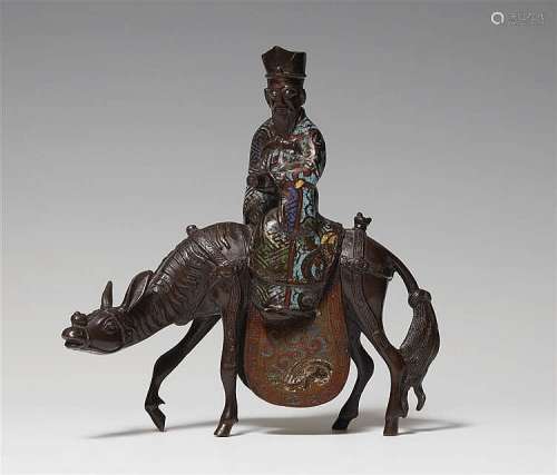 A bronze and enamel champlevé figure on a donkey. Late 19th century