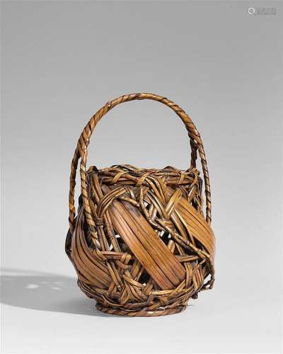 A bamboo ikebana basket. 20th century