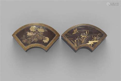 Two fan-shaped Komai iron lidded boxes. Late 19th century