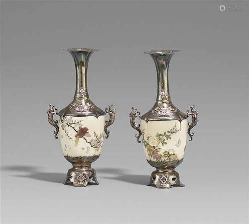 A pair of silver and ivory Shibayama vases. Late 19th century