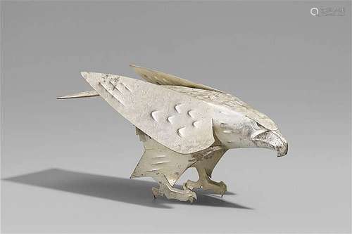 A silvery sheet metal figure of a falcon by Katô Sôgan (1899-1995). Around 1950-1970