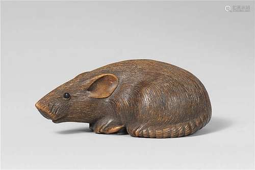 A boxwood netsuke of a rat. Mid-19th century