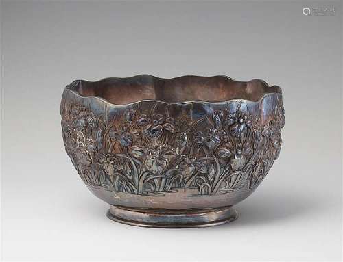 A large double-walled silver bowl. Around 1900