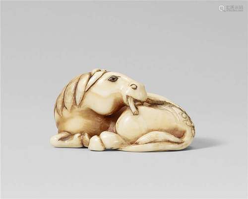 A good Kyoto school ivory netsuke of a recumbent horse, by Rangyoku. Late 18thcentury