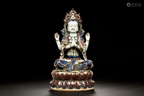 FAMILLE ROSE FOUR-ARM GUANYIN SEATED FIGURE