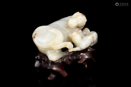 A WHITE JADE CARVING OF TWO HORSES