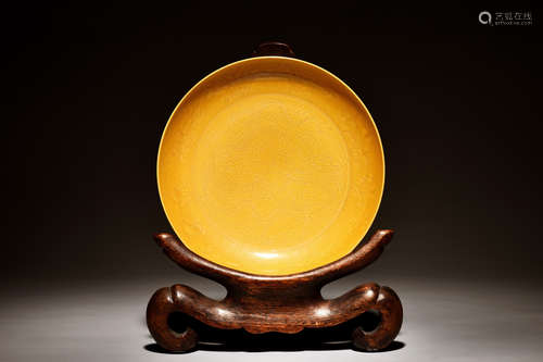 YELLOW GLAZED AND CARVED 'DRAGONS' DISH