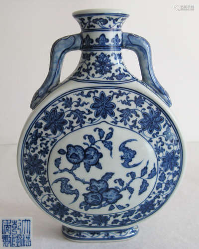 A BLUE AND WHITE VASE WITH QIANLONG MARK