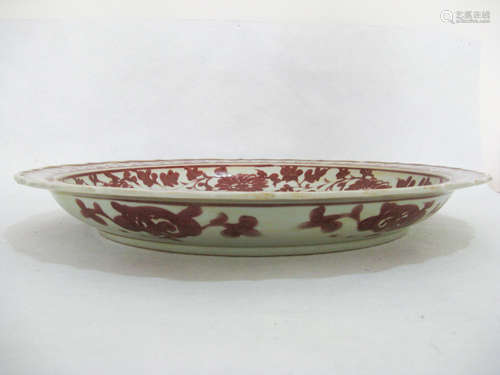 A UNDERGLAZE RED FLORAL RIM CHARGER