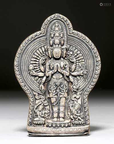 A SILVER REPOUSSE RELIEF OF THE 1000-ARMED AVALOKITESHVARA.