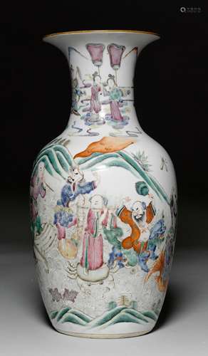 A FAMILLE ROSE VASE WITH THE EIGHT IMMORTALS ON SPIRALING WAVES.