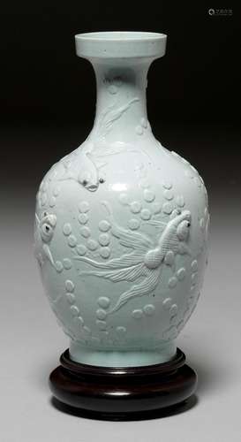 A LIGHT BLUE VASE WITH RELIEF DESIGN OF GOLDFISH.