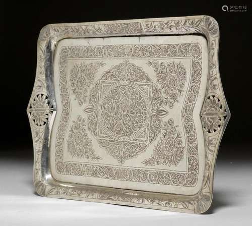 A SILVER TRAY WITH ENGRAVED FLORAL DESIGN.