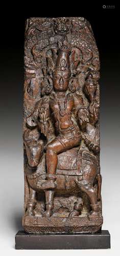 A WOOD STELE OF SHIVA.