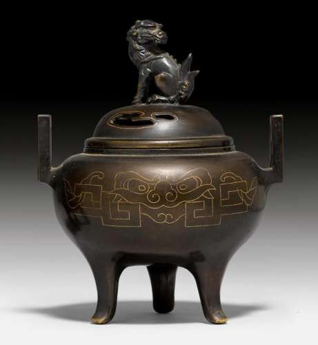 A BRONZE INCENSE BURNER WITH LION FINIAL.