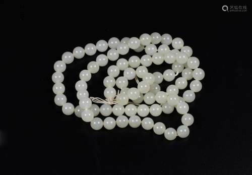 A White Beads Necklace and Bracelets