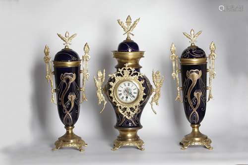 A Group of Three Gilding Clock.