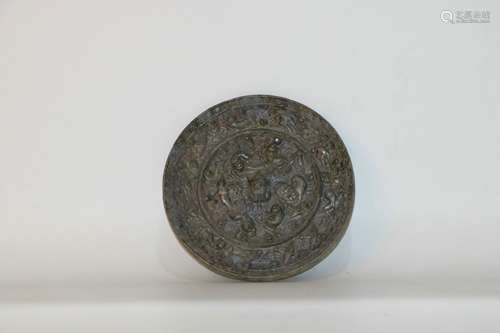 A Chinese Bronze Mirror.