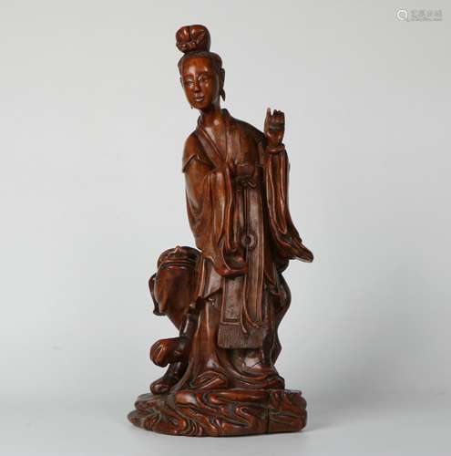 A Phoebe Zhennan Wood Carved Decoration.