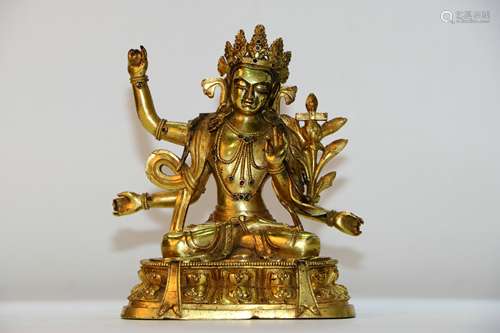 A Chinese Bronze Gilding Buddha Statue.