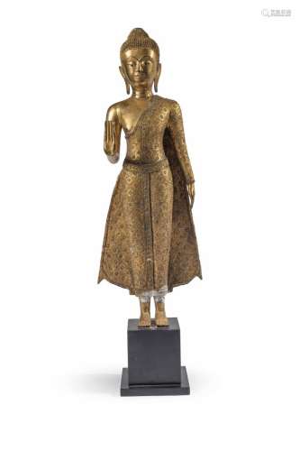 Statuette de bouddha en bronze laqué or