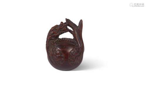 Netsuke en buis