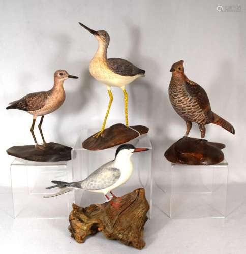 FOUR LIFE SIZE RUBOLINO CARVED BIRDS:
