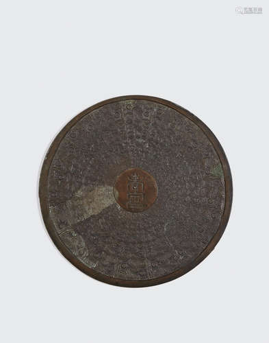 Meiji era A patinated bronze mirror