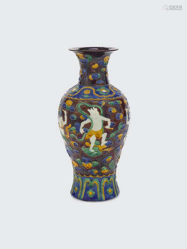 Kangxi mark, late Qing/Republic period A fahua-style baluster vase