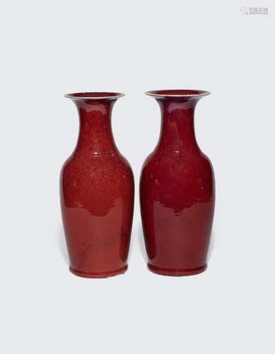 Late Qing/Republic period A pair of tall transmutation red baluster vases