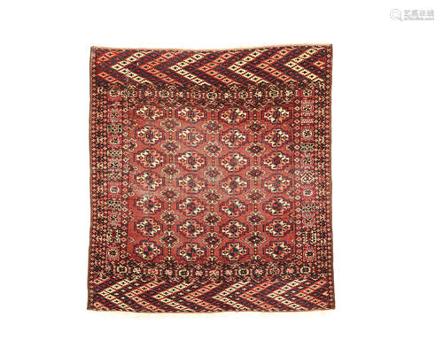 a group of Three rugs