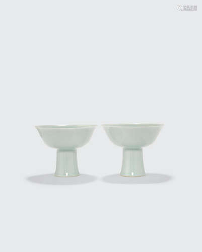 Late Qing/Republic period A pair of pale greenish-white glazed footed bowls