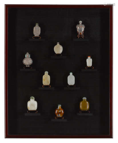 A shadow box of snuff bottles