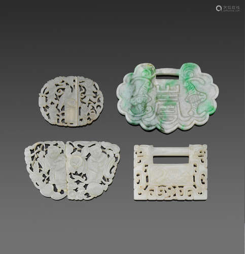 a group of Four jade carvings