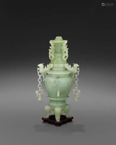 A carved green hardstone censer and cover