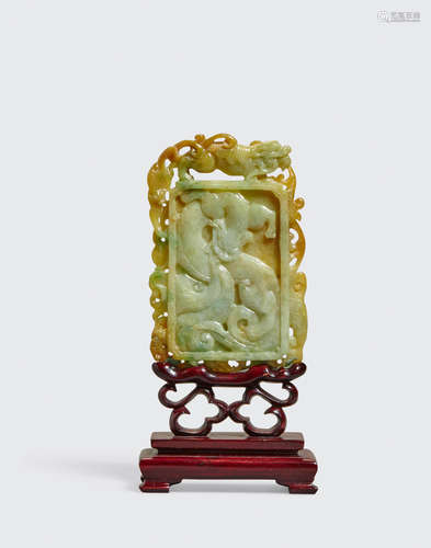 A carved jadeite plaque