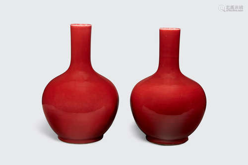 Late Qing/Republic period A pair of copper red glazed stick neck vases, tianqiuping