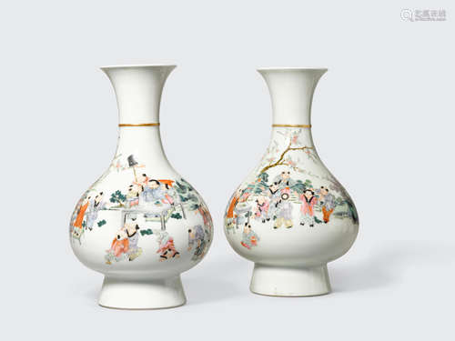 Qianlong marks, late 20th century A pair of famille rose enameled bottle vases