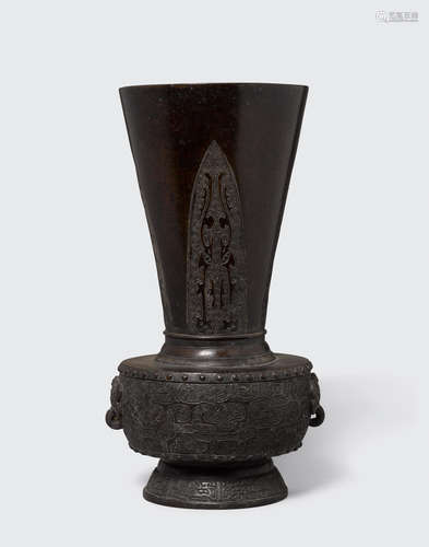 A cast bronze archaistic vase