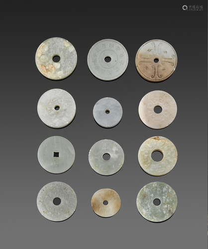 a group of Twelve jade and hardstone bi disks