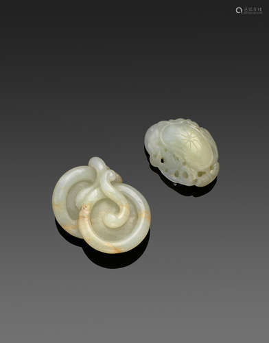 Two small jade toggles